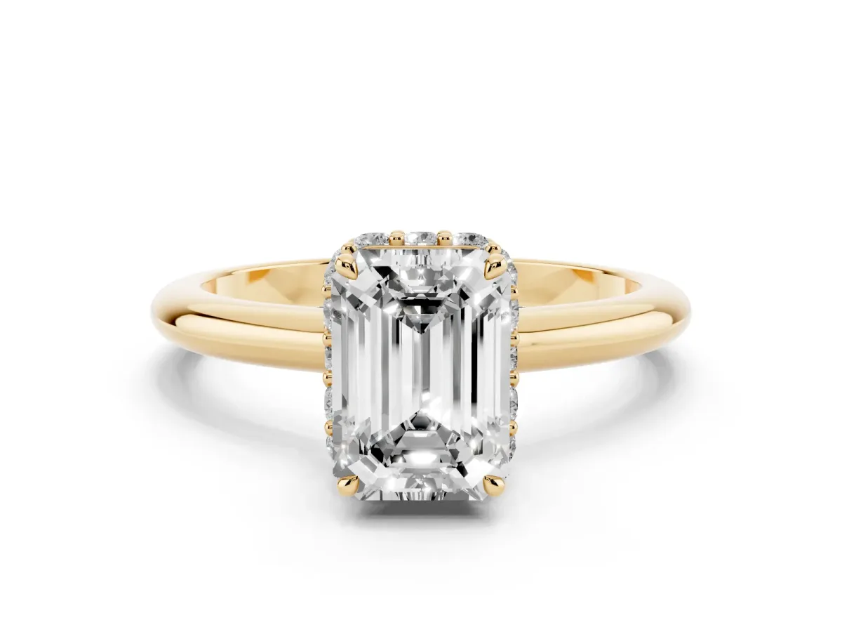 Emerald Cut Brilliant Solitaire Engagement Ring with Six-Prong Setting and Classic Band Yellow gold