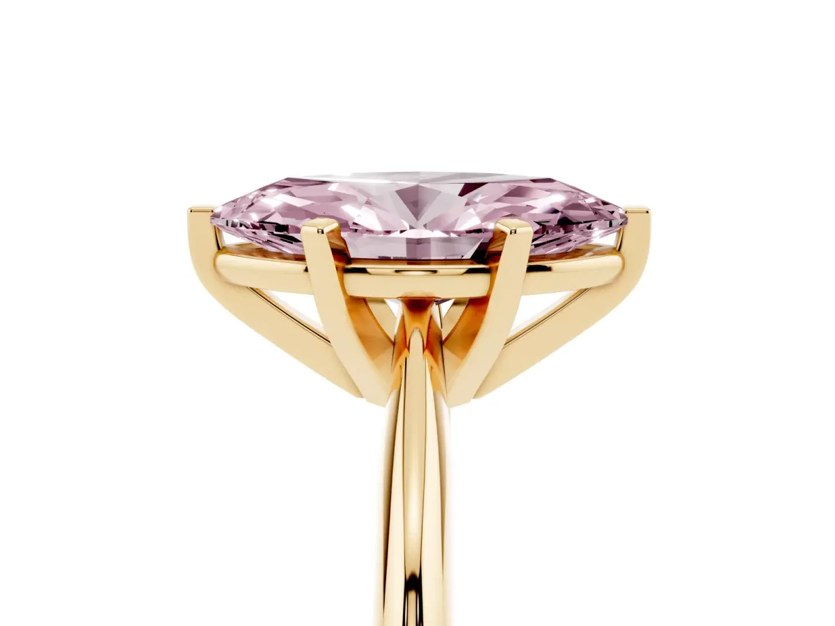 Fancy Pink Marquise Cut Cut Solitaire Ring with Four-Prong Setting on a Classic Band Yellow gold