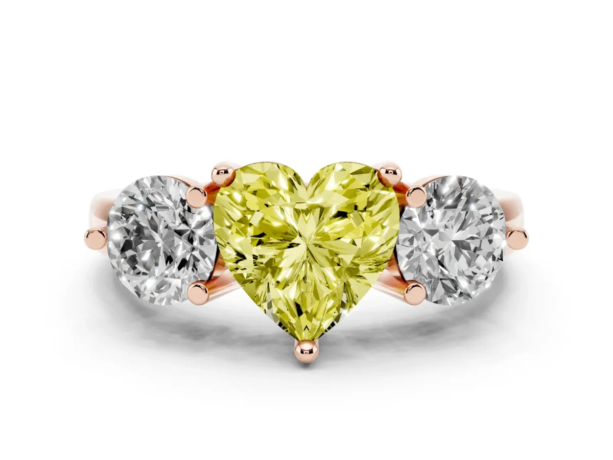 Fancy Yellow Three-Stone Heart Cut Brilliant Cut Solitaire Ring with Prong Setting on a Classic Band Rose gold