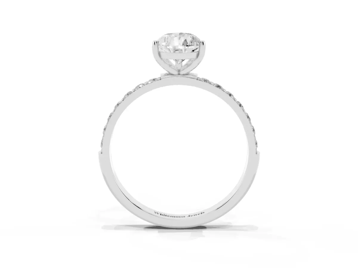 Pear Cut Diamond Solitaire Ring with Round Pavé Shoulders and Prong Setting Platinum