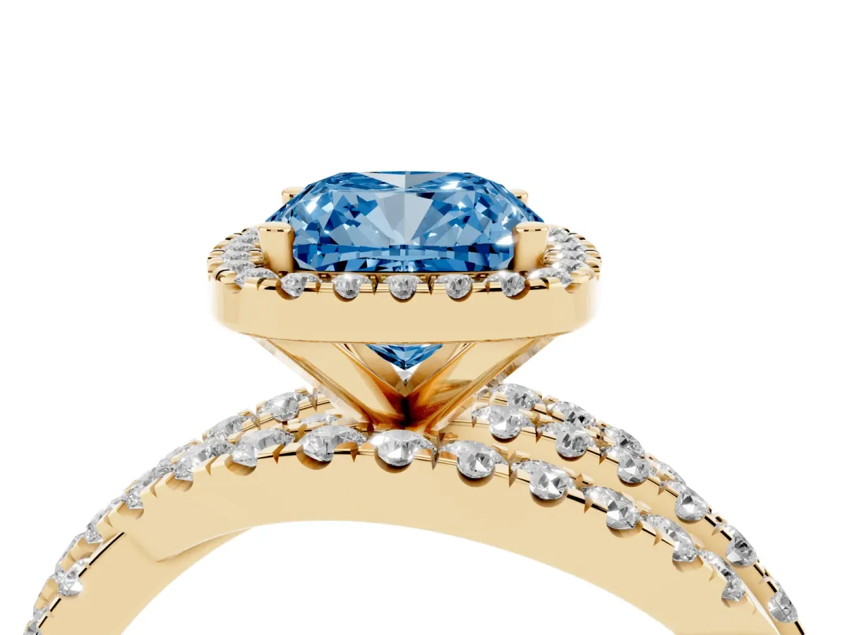Fancy Blue Cushion Cut Diamond Halo Ring with Round Split Shank and Prong Setting Yellow gold