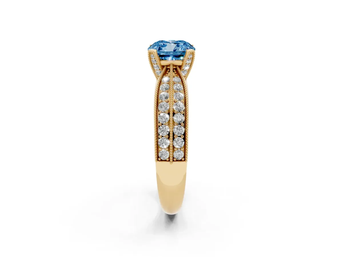 Fancy Blue Cushion Cut Diamond Solitaire Ring with Milgrain Round Pavé Band and Prong Setting Yellow gold