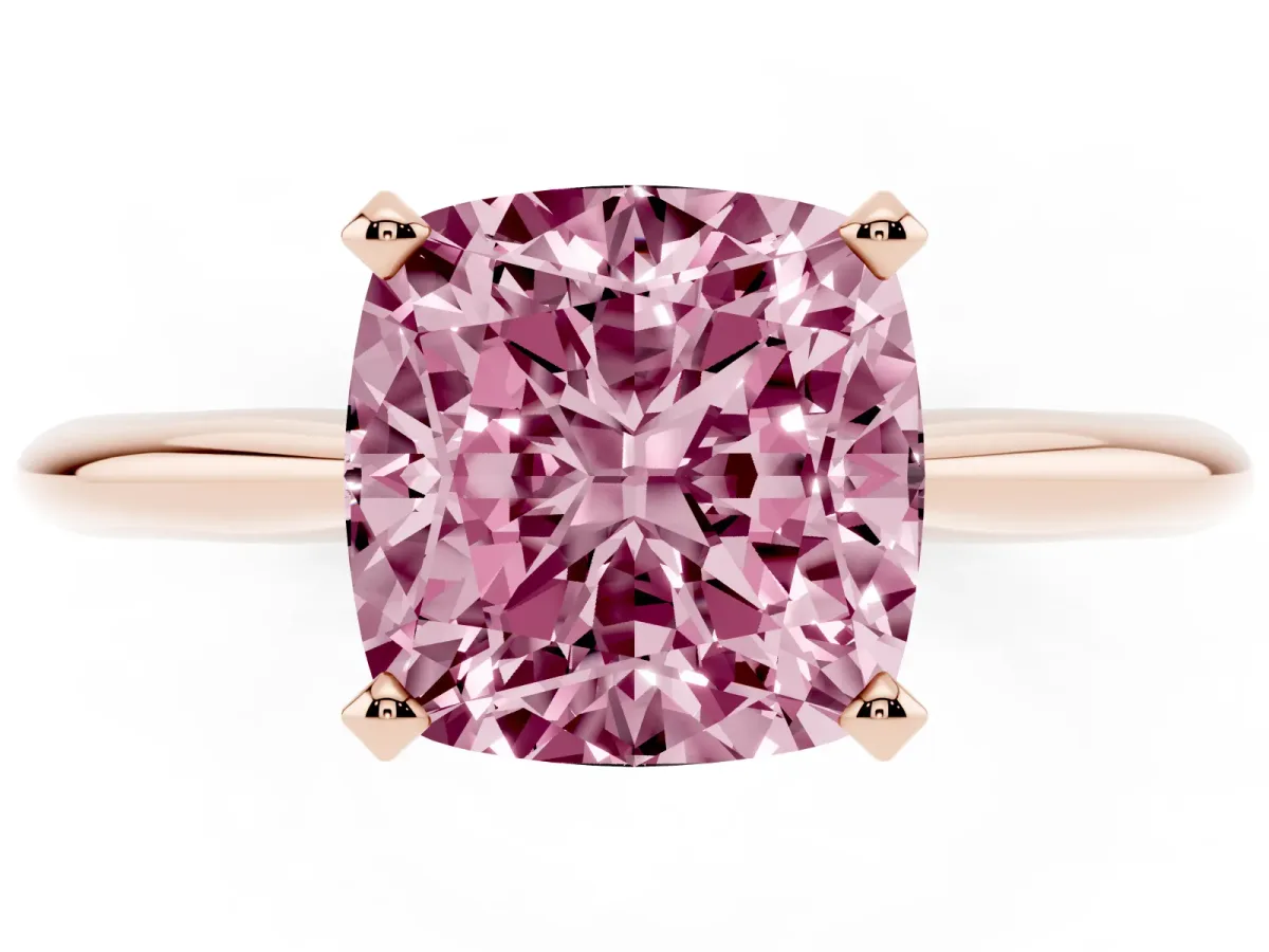 Fancy Pink Cushion Cut Cut Solitaire Ring with Four-Prong Setting on a Classic Band Rose gold