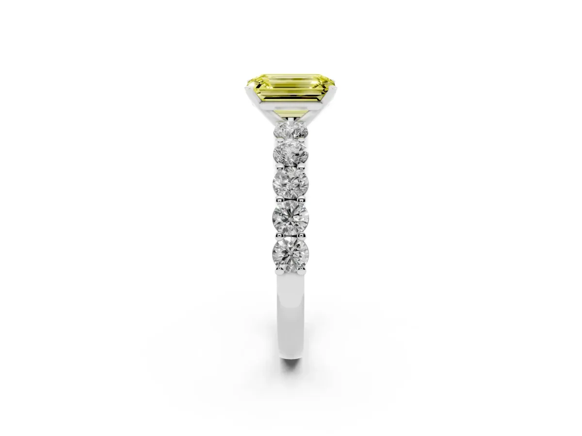 Fancy Yellow Emerald Cut Diamond Solitaire Ring with Shared Prong Round Side Stones Platinum