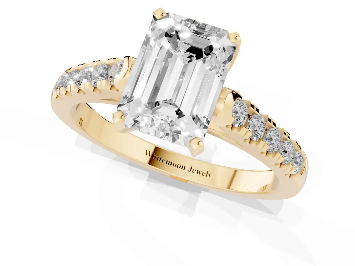 Emerald Cut Diamond Pavé Band Solitaire Ring with Prong Setting Yellow gold
