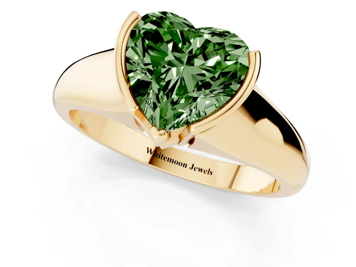 Fancy Green Heart Cut Solitaire Tension Set Diamond Ring with Split Shank Band Yellow gold