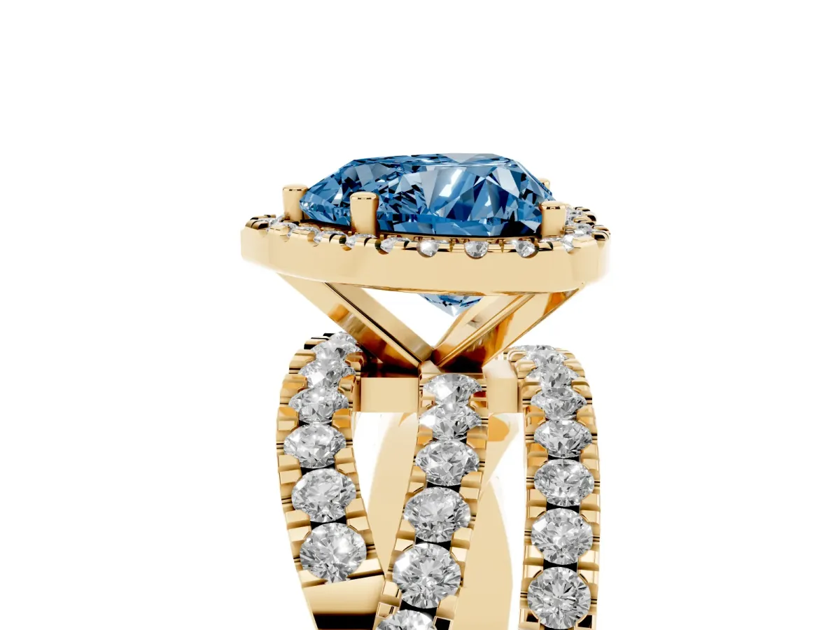 Fancy Blue Heart Cut Diamond Halo Ring with Round Split Shank and Prong Setting Yellow gold