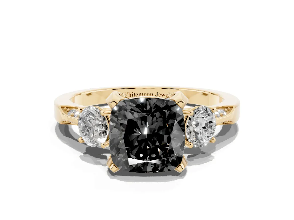 Fancy Black Cushion Cut Brilliant Three-Stone Diamond Ring with Pavé Band and Four-Prong Setting Yellow gold