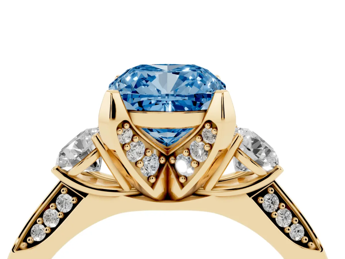 Fancy Blue Cushion Cut Brilliant Three-Stone Diamond Ring with Pavé Band and Four-Prong Setting Yellow gold