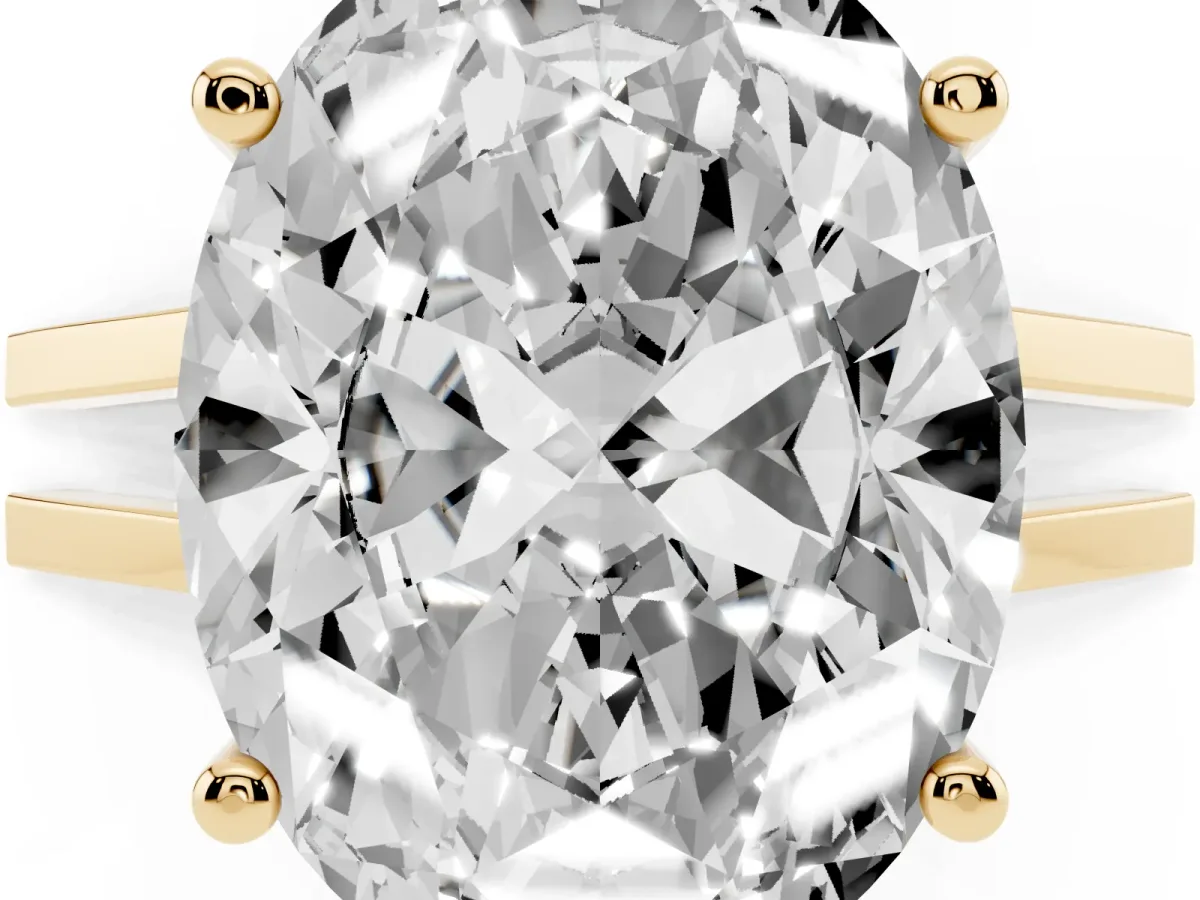 Oval Cut Cut Diamond Solitaire Engagement Ring with Tapered Plain Band and Four-Prong Setting Yellow gold
