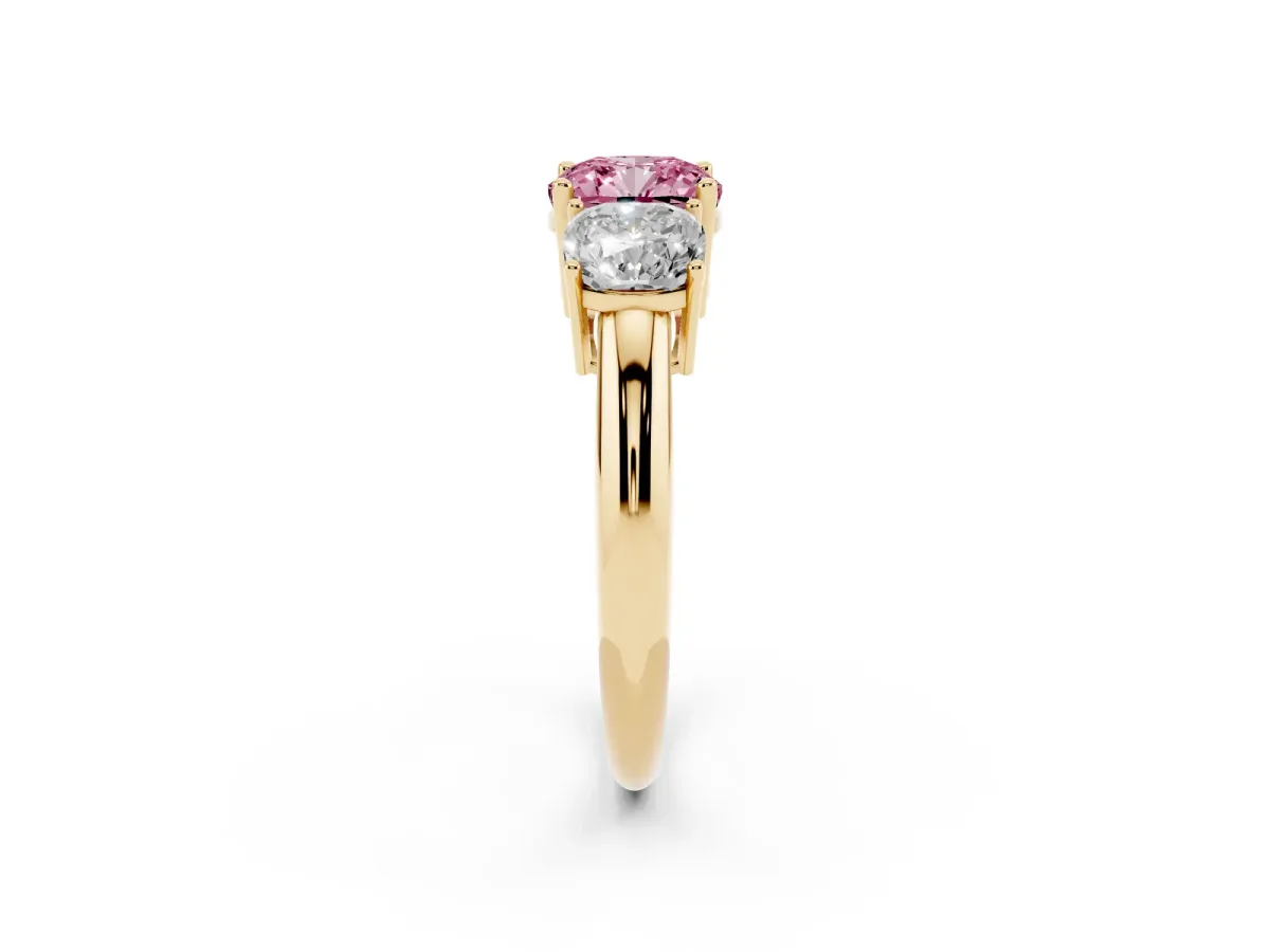 Fancy Pink Three-Stone Cushion Cut Cut Diamond Engagement Ring with Prong Setting on a White Gold Band Yellow gold
