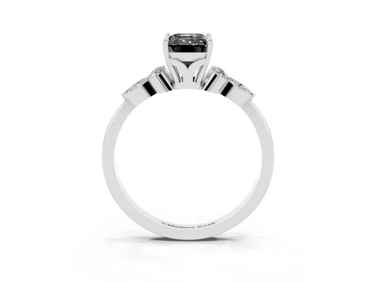 Fancy Black Emerald Cut Brilliant Diamond Solitaire Ring with Pear Side Stones and Four-Prong Setting Silver