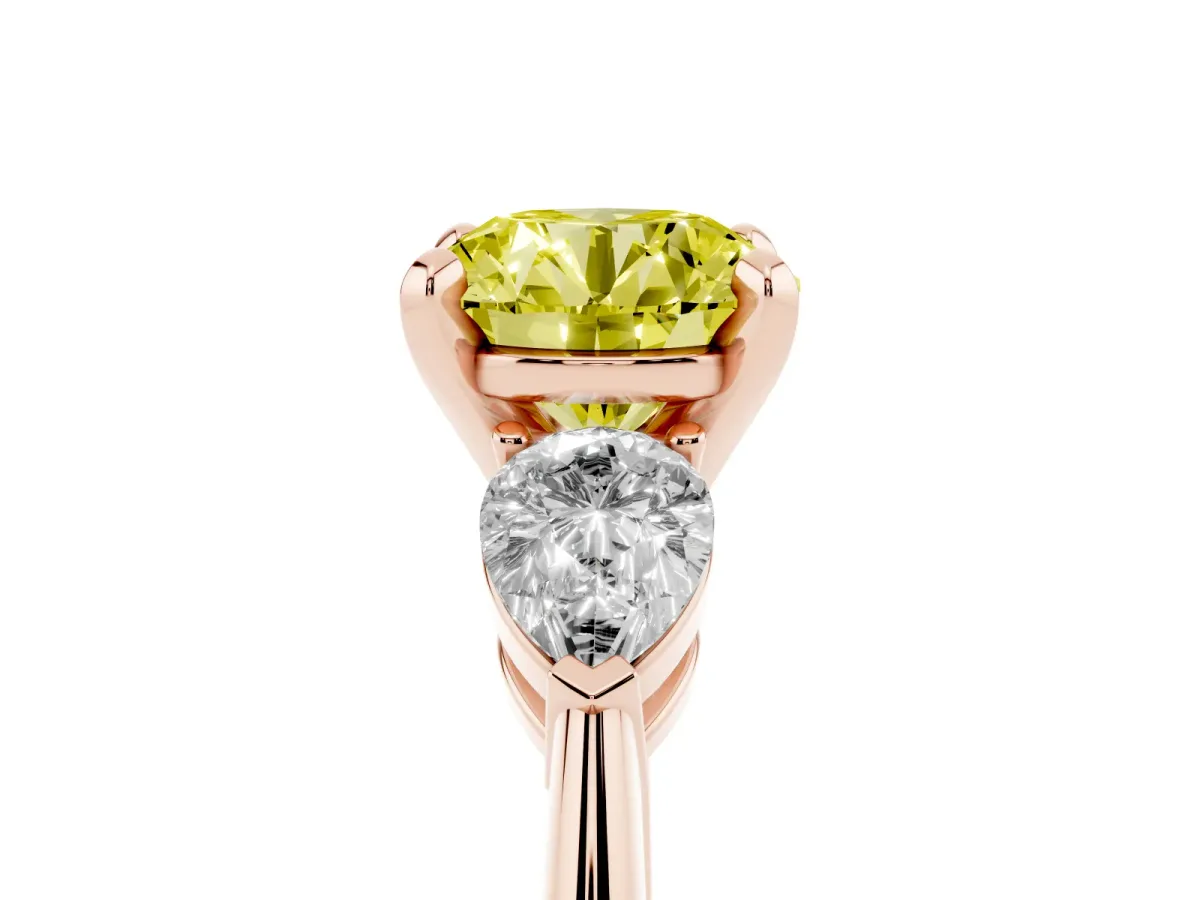 Fancy Yellow Three-Stone Round Cut Diamond Ring with Pear Side Stones and Four-Prong Setting Rose gold
