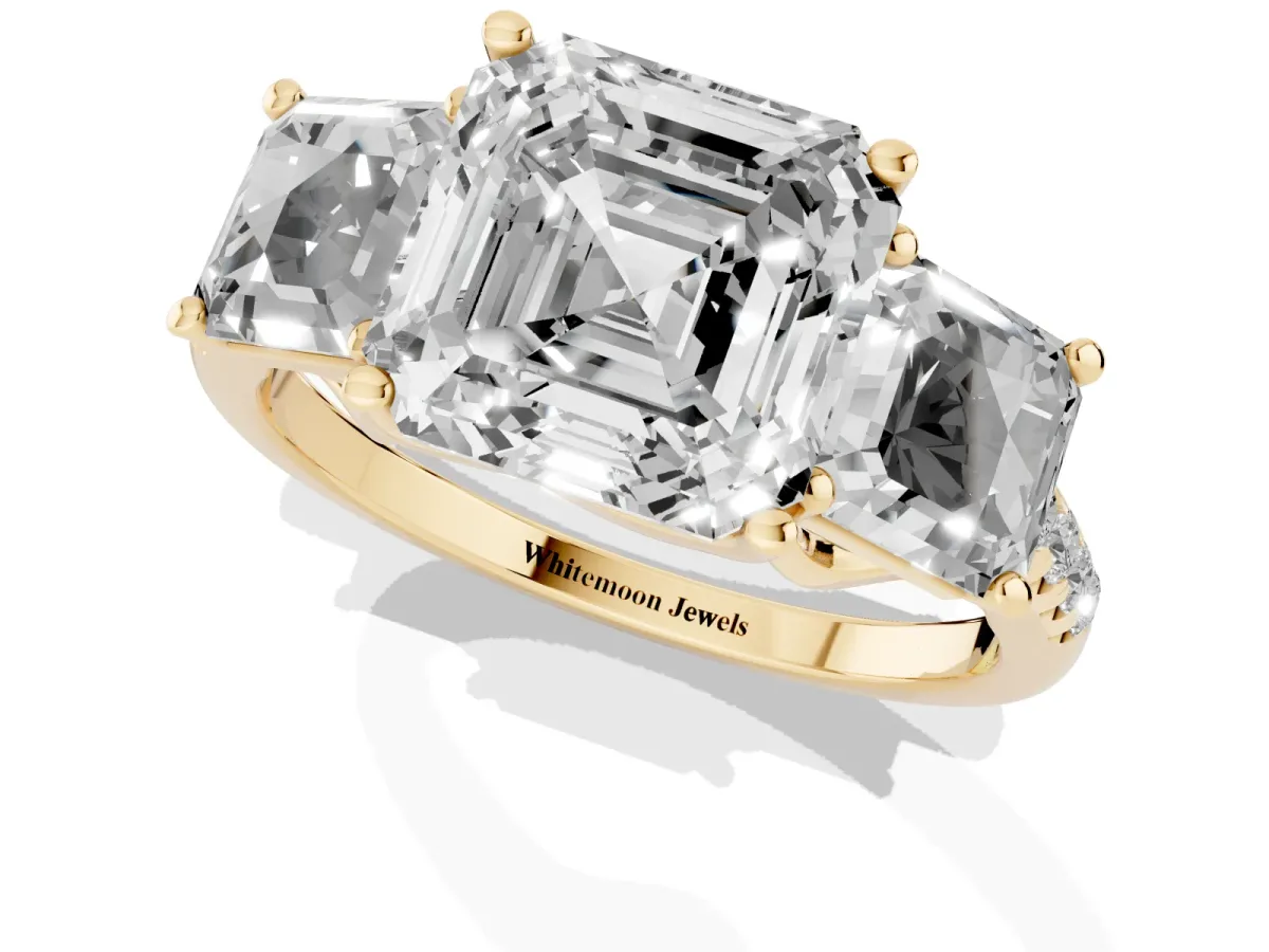 Three-Stone Asscher Cut Diamond Ring with Round Pavé Band and Prong Setting Yellow gold