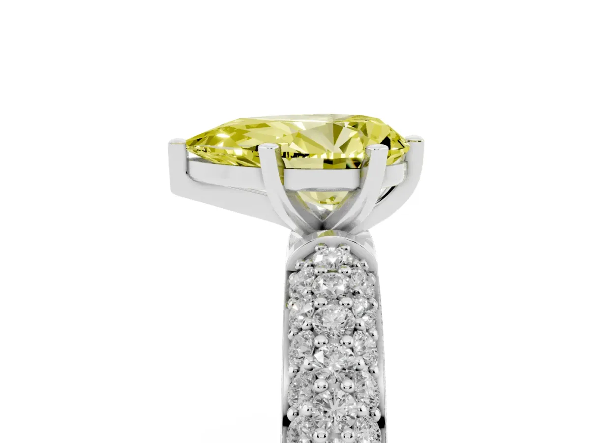 Fancy Yellow Pear Cut Diamond Solitaire Ring with Prong Setting and Pavé Band Silver