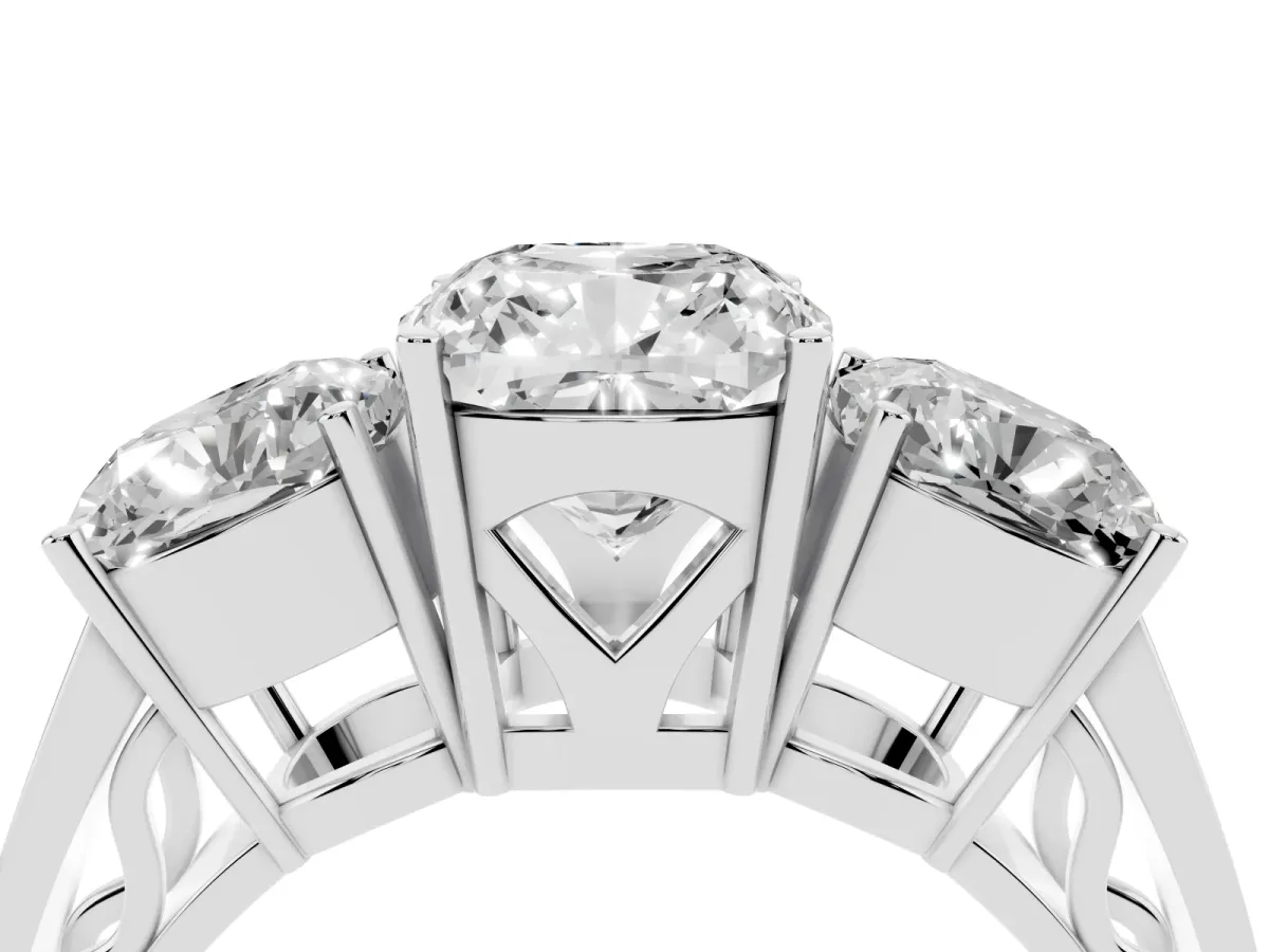 Cushion Cut Diamond Three-Stone Ring with Prong Setting and Textured Band Platinum
