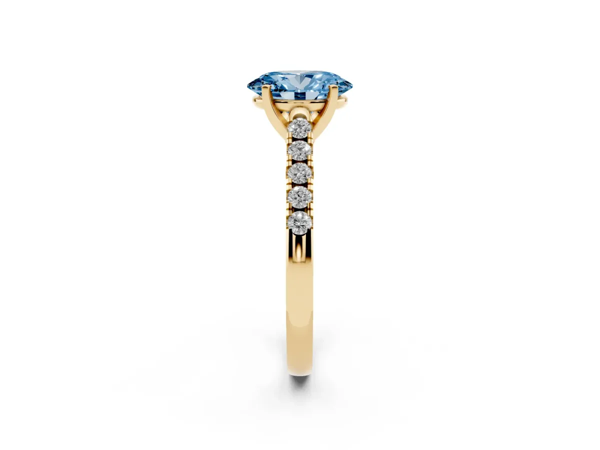 Fancy Blue Oval Cut Diamond Pavé Band Solitaire Ring with Prong Setting Yellow gold