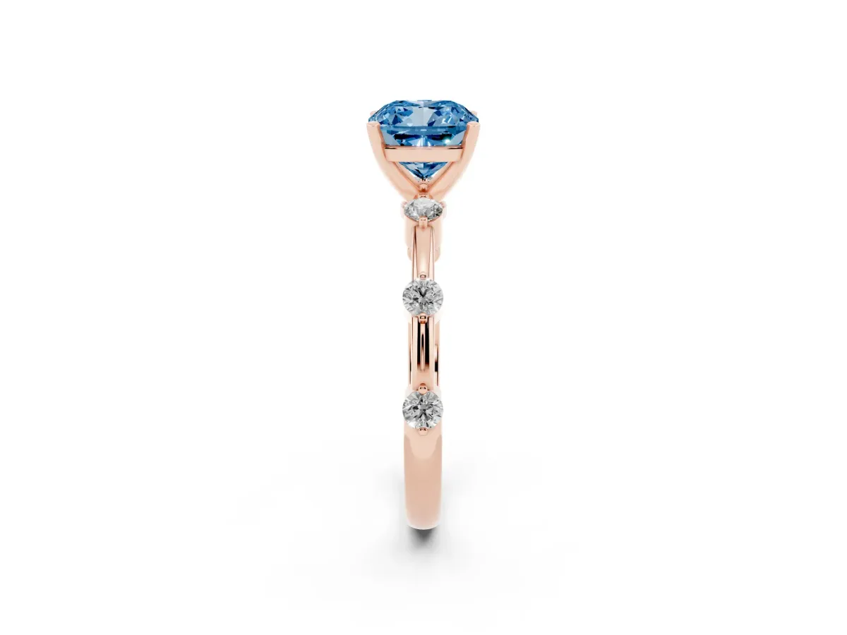 Fancy Blue Cushion Cut Solitaire Diamond Ring with Bezel Set Side Stones and Prong Setting Rose gold