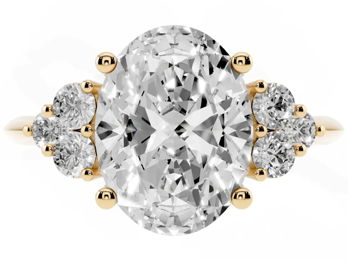 Oval Cut Cut Diamond Cluster Ring with Solitaire Band and Four-Prong Setting Yellow gold