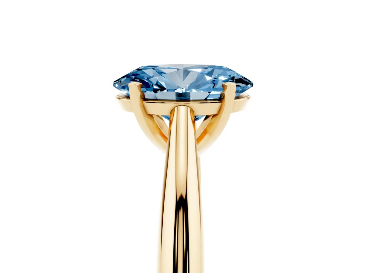 Fancy Blue Oval Cut Diamond Solitaire Engagement Ring with Cathedral Setting and Four-Prong Mount Yellow gold