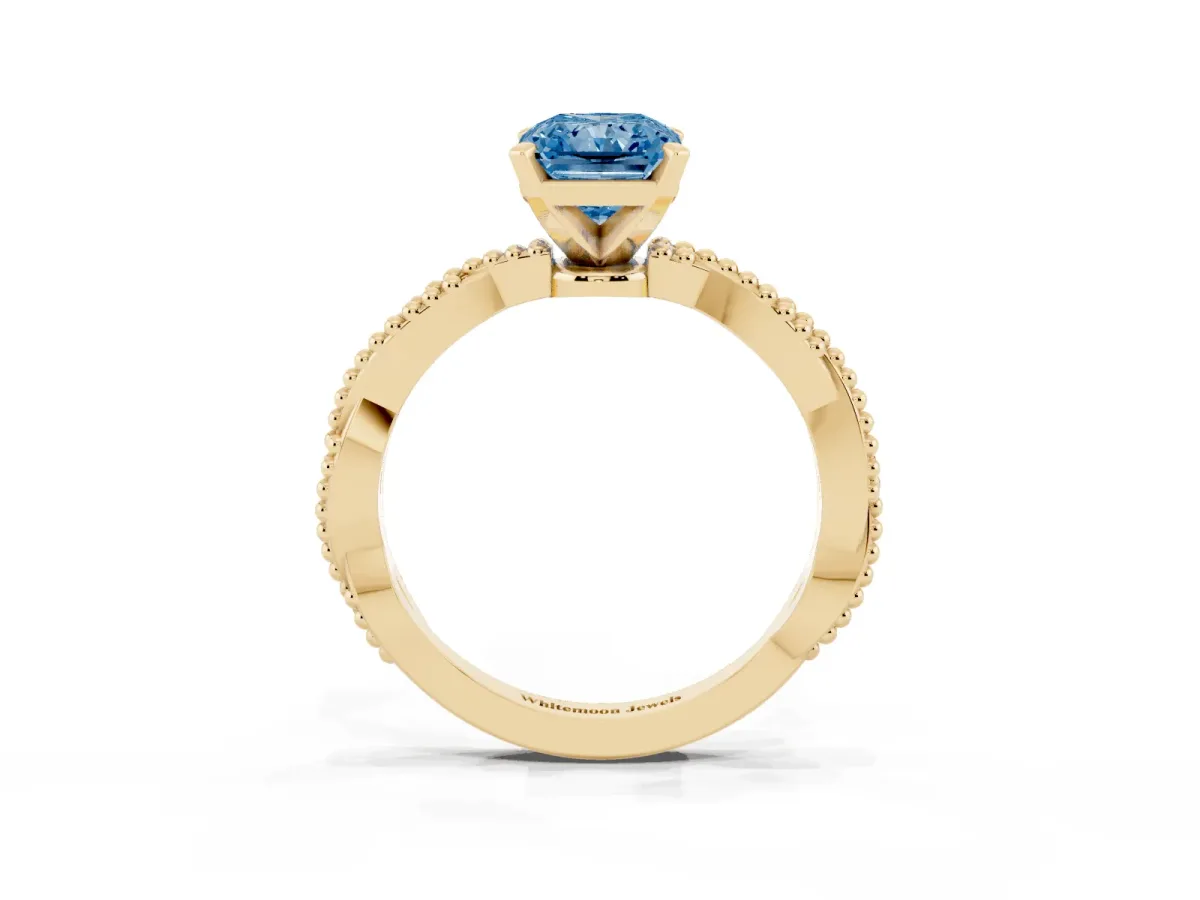 Fancy Blue Radiant Cut Solitaire Twisted Band with Bead Prong Setting Yellow gold