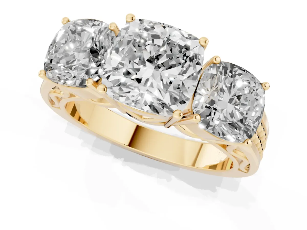 Cushion Cut Diamond Three-Stone Ring with Prong Setting and Textured Band Yellow gold