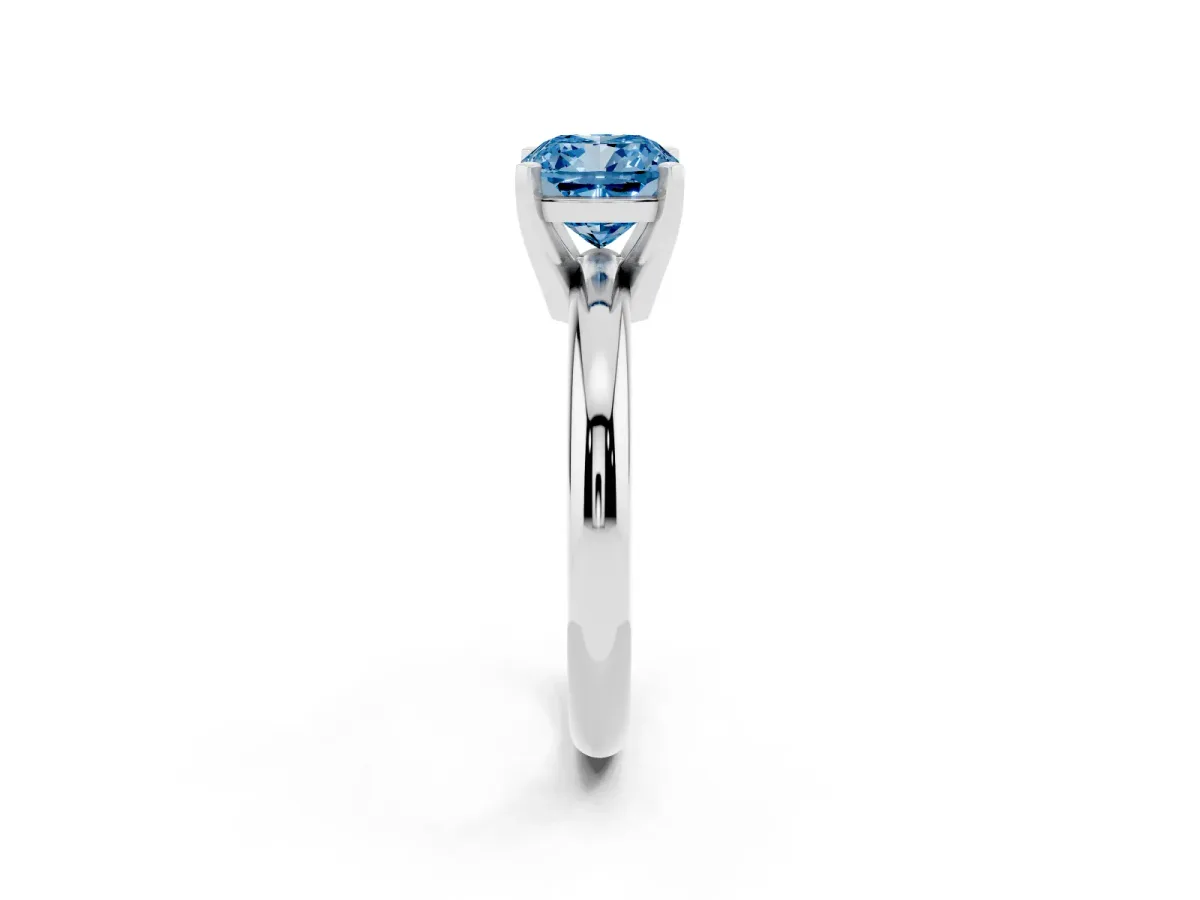 Fancy Blue Cushion Cut Diamond Solitaire Engagement Ring with Round Band and Four-Prong Setting Platinum