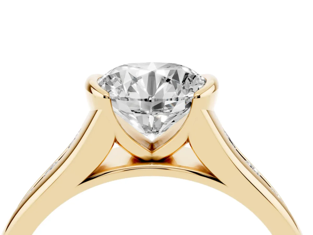 Round Cut Solitaire Bezel-Set Diamond Ring with Channel-Set Band Yellow gold