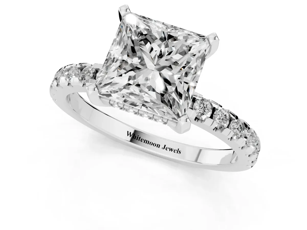 Princess Cut Diamond Solitaire Ring with Round Pavé Band and Four-Prong Setting Silver