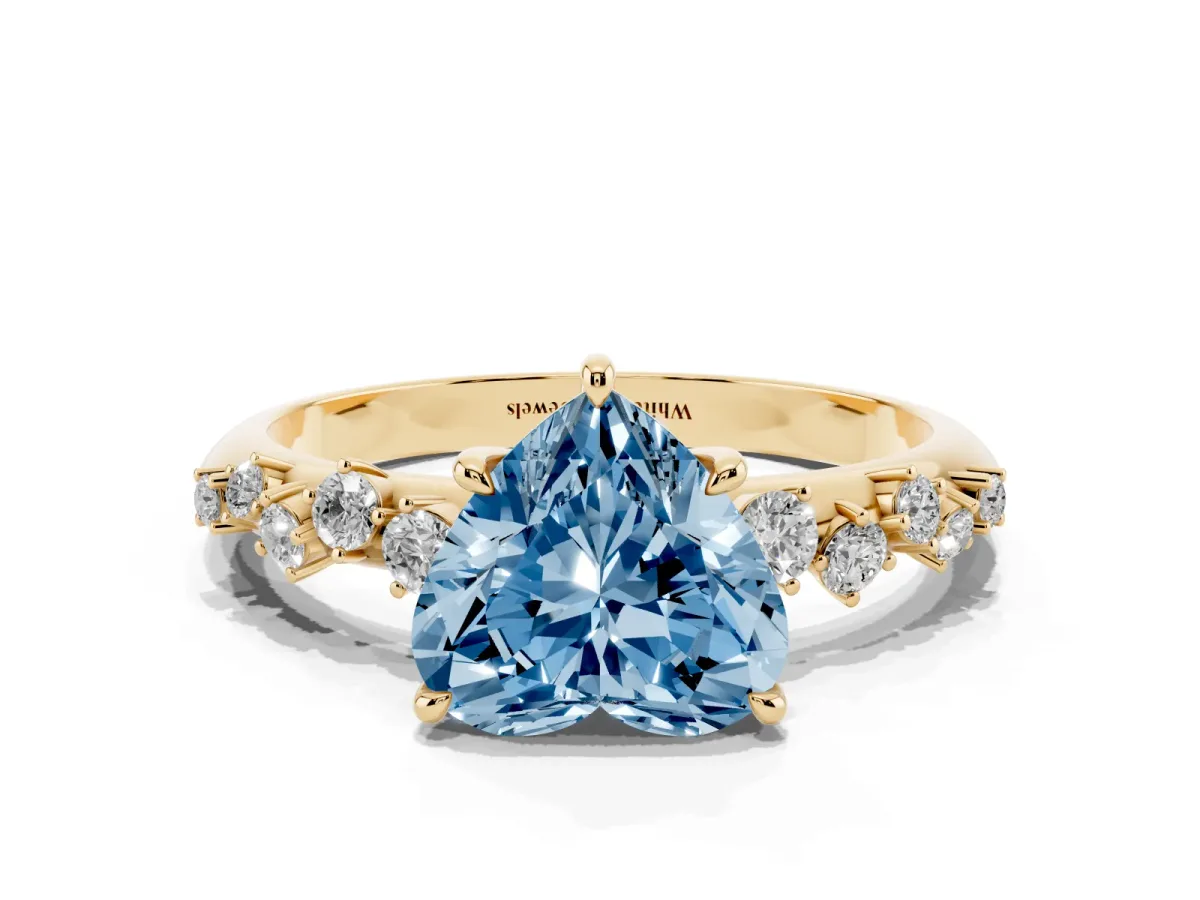 Fancy Blue Heart Cut Diamond Cluster Side Stone Solitaire Ring with Prong Setting Yellow gold