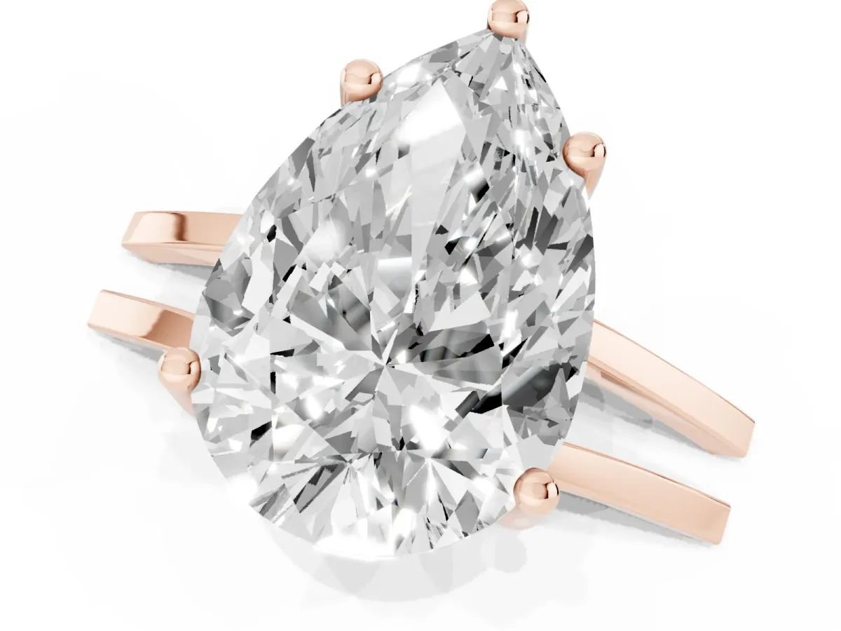 Pear Cut Cut Diamond Solitaire Engagement Ring with Tapered Plain Band and Four-Prong Setting Rose gold