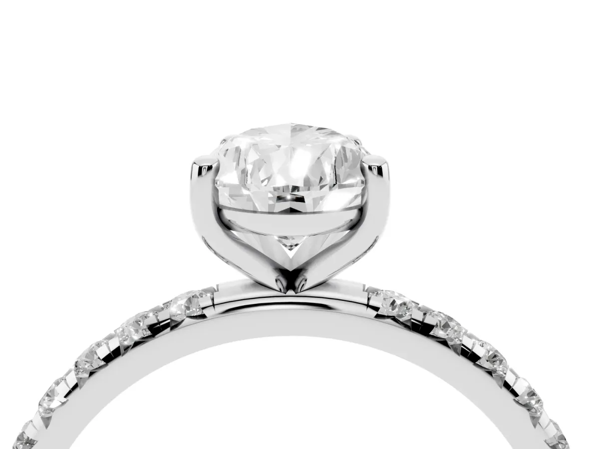 Pear Cut Cut Diamond Solitaire Ring with Micro Pave Band and Four Prong Setting Silver