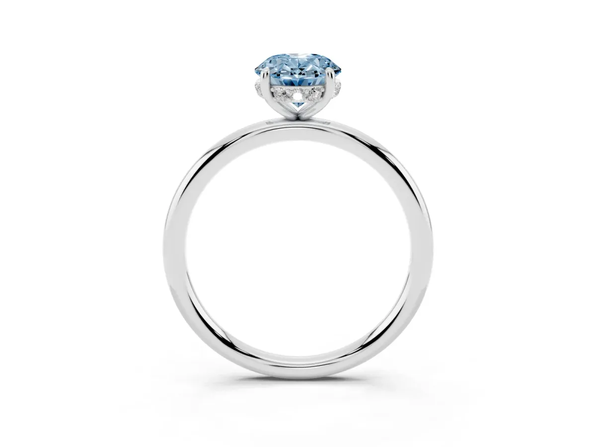 Fancy Blue Oval Cut Solitaire Diamond Ring with a Classic Band and Four-Prong Setting Platinum