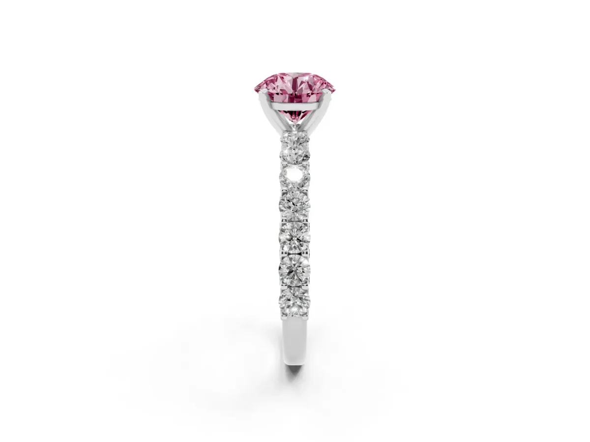 Fancy Pink Round Cut Diamond Solitaire Ring with Shared Prong Pavé Band and Four-Prong Setting Silver