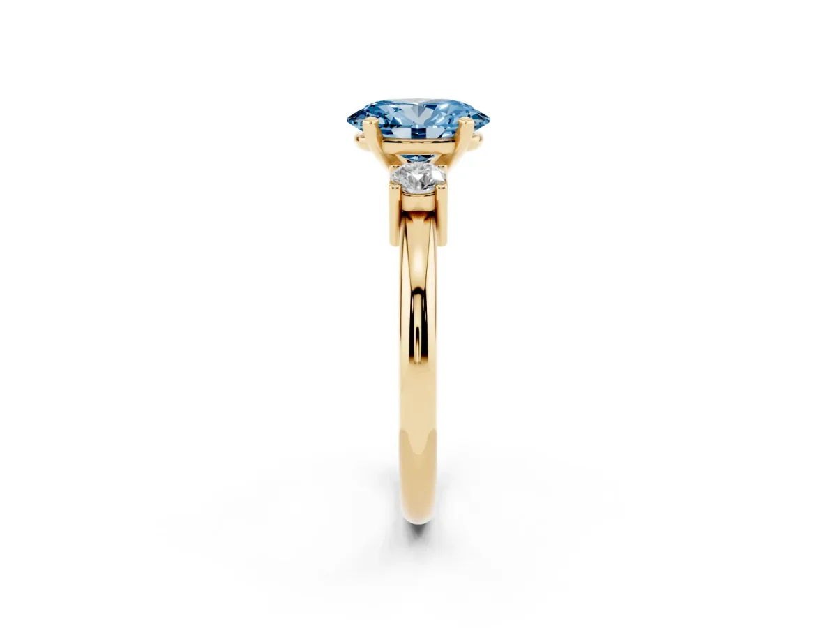 Fancy Blue Three-Stone Oval Cut Cut Diamond Solitaire with Prong Setting and Classic Band Yellow gold