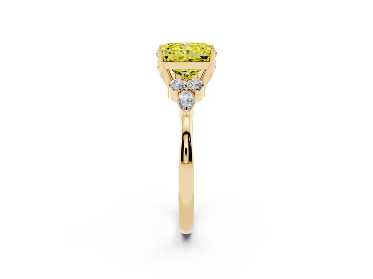 Fancy Yellow Radiant Cut Brilliant Diamond Solitaire Ring with Pear Side Stones and Four-Prong Setting Yellow gold
