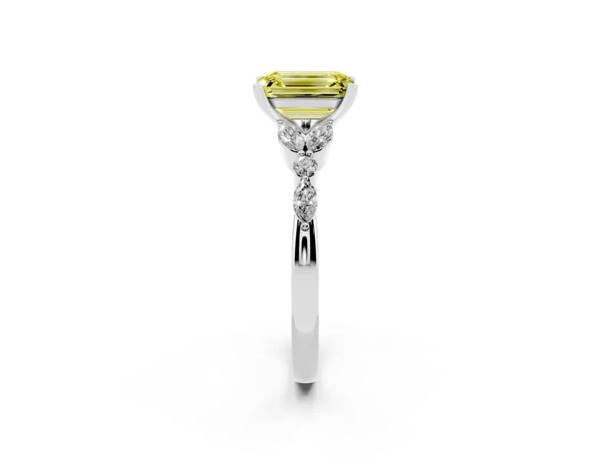 Fancy Yellow Emerald Cut Diamond Solitaire Ring with Side Stones and Four-Prong Setting Platinum