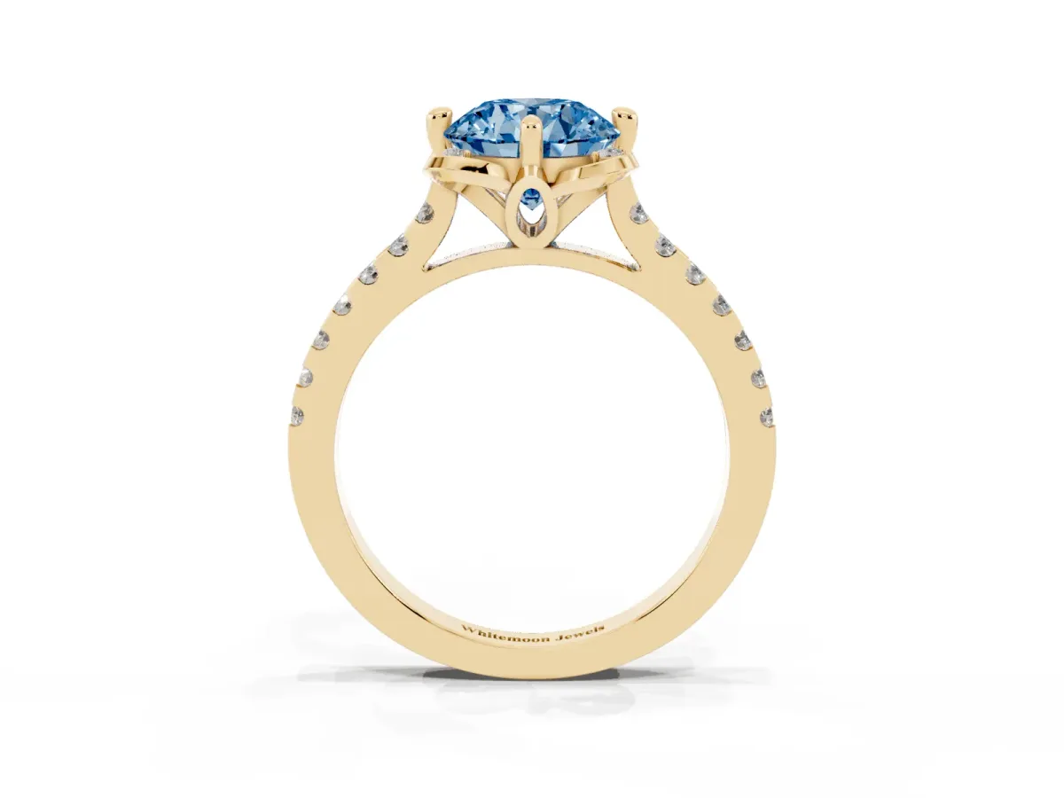 Fancy Blue Round Cut Diamond Ring with Pavé Band and Floral Prong Setting Yellow gold