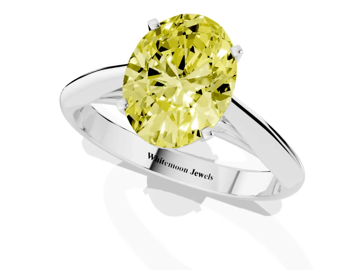 Fancy Yellow Oval Cut Diamond Solitaire Engagement Ring with Cathedral Setting and Four-Prong Mount Silver