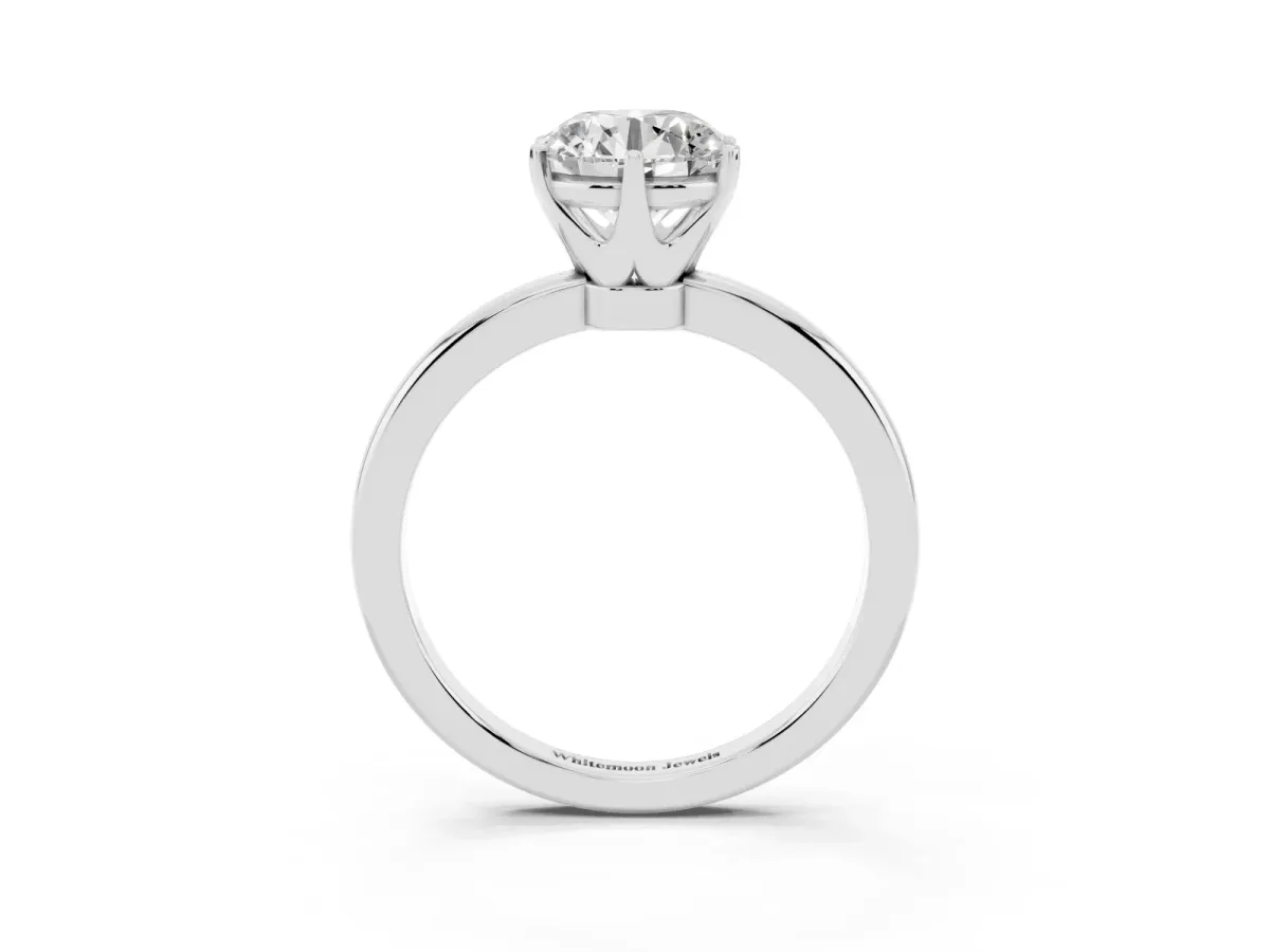 Round Cut Solitaire Diamond Ring with Six-Prong Setting on a Classic Band Silver