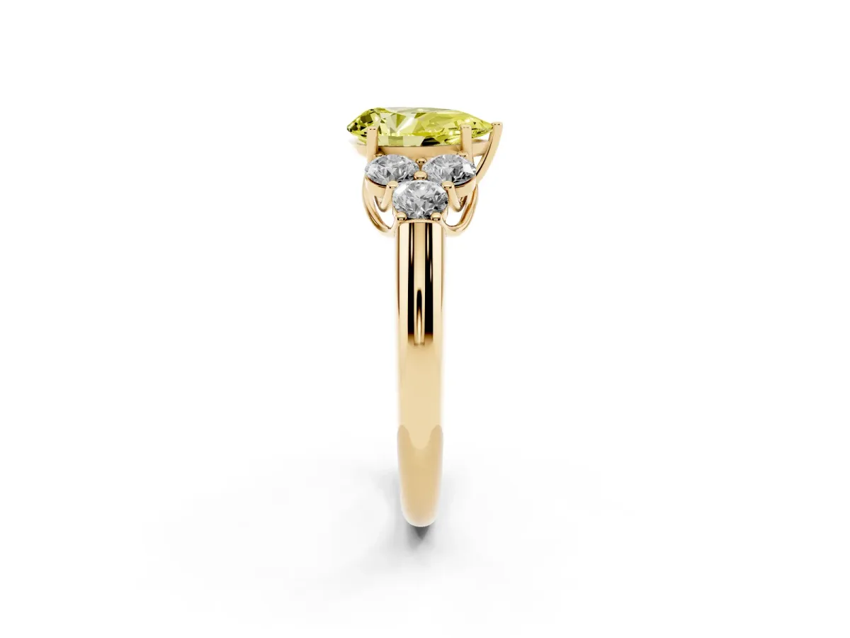 Fancy Yellow Pear Cut Cut Diamond Cluster Ring with Round Accent Stones and Prong Setting on a Classic Band Yellow gold