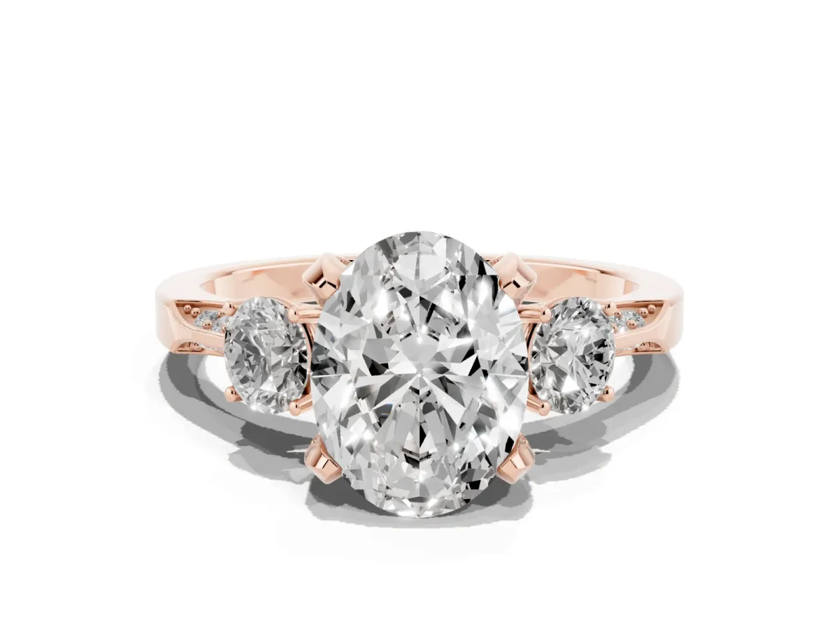 Oval Cut Brilliant Three-Stone Diamond Ring with Pavé Band and Four-Prong Setting Rose gold
