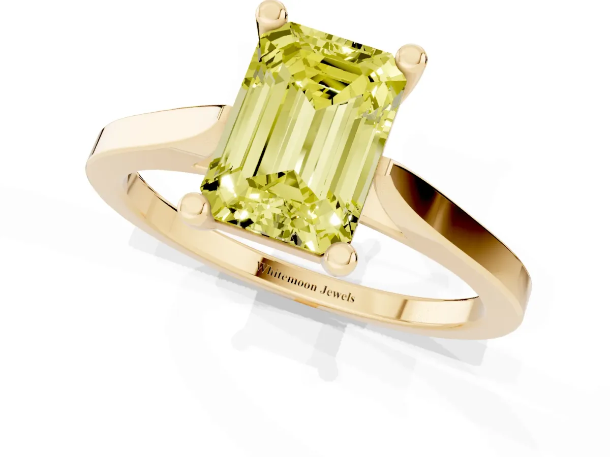 Fancy Yellow Emerald Cut Solitaire Diamond Ring with Four-Prong Setting and Tapered Band Yellow gold