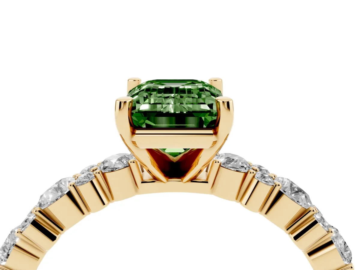 Fancy Green Emerald Cut Diamond Side Stone Solitaire Ring with Round and Four-Prong Setting Yellow gold