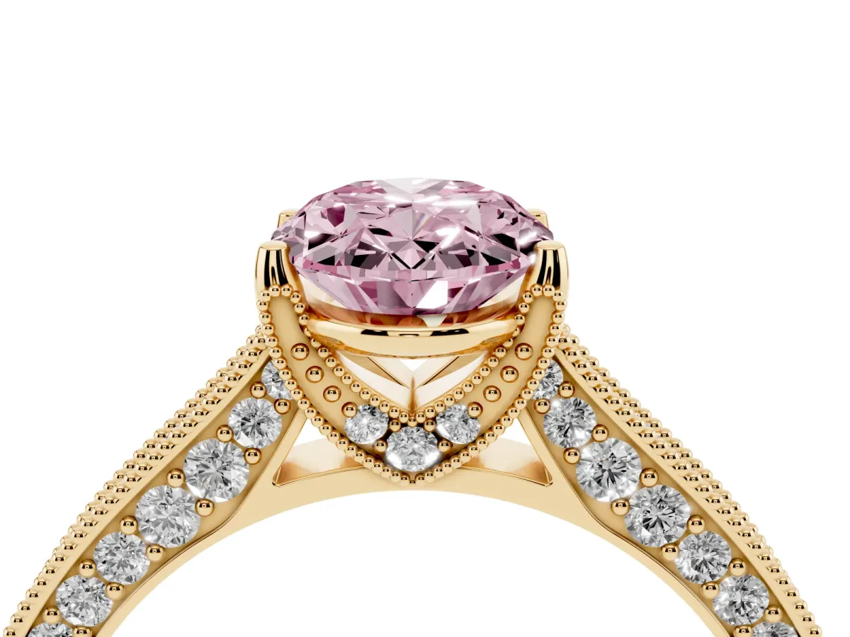 Fancy Pink Oval Cut Cut Diamond Solitaire Ring with Milgrain Pave Band and Four Prong Setting Yellow gold
