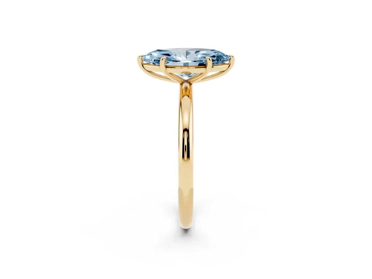 Fancy Blue Marquise Cut Solitaire Diamond Ring with Four-Prong Setting on a Plain Band Yellow gold