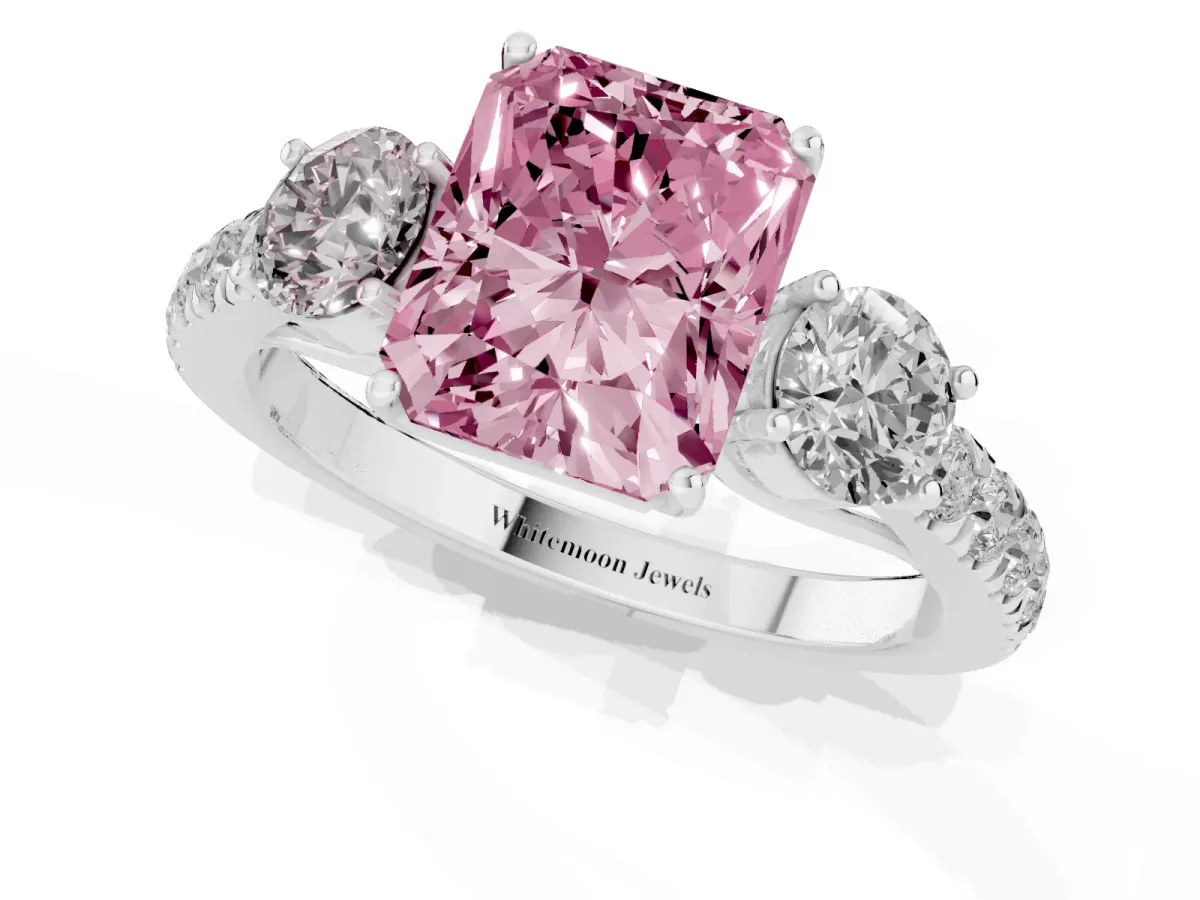 Fancy Pink Radiant Cut Cut Diamond Three-Stone Ring with Round Side Stones and Pavé Band Silver
