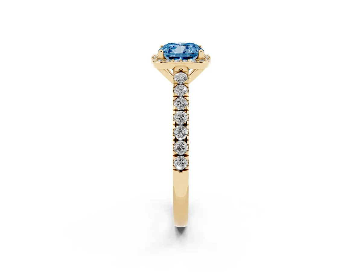 Fancy Blue Cushion Cut Cut Halo Diamond Engagement Ring with Pave Band and Four-Prong Setting Yellow gold