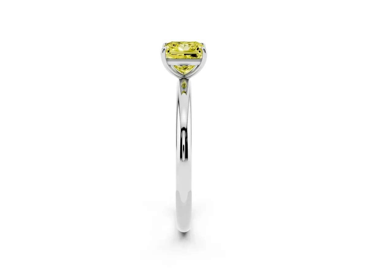 Fancy Yellow Princess Cut Solitaire Diamond Ring with Four-Prong Setting on a Plain Band Silver