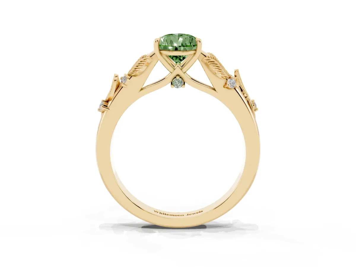 Fancy Green Pear Cut Diamond Solitaire Ring with Leaf Motif Band and Four-Prong Setting Yellow gold
